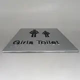 girls toilet braille sign